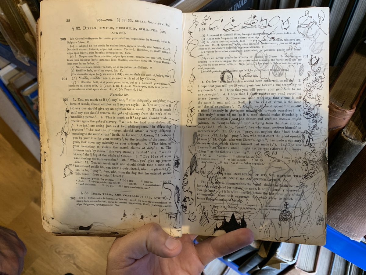 Chesterton's doodles inside his boyhood Latin book.